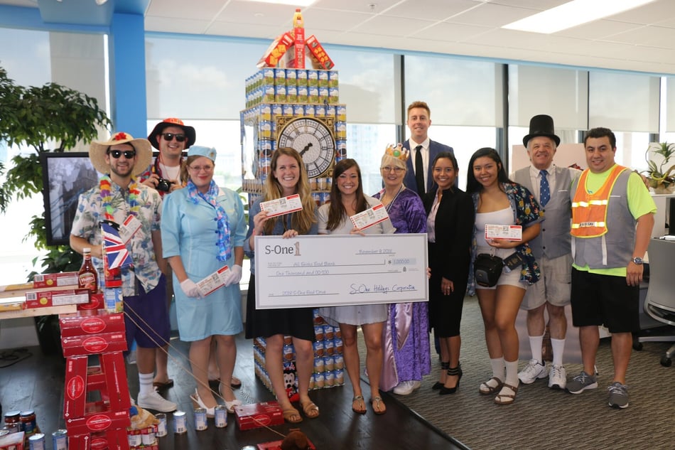 S-One Goes Around the World for All Faiths Food Bank